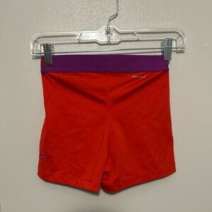 Nike Red and Purple Bike Shorts for Active Performance